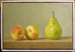 Two peaches with green pear on brown table in front of green-grey wall