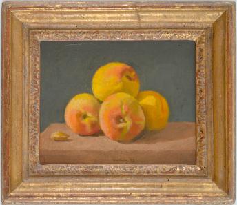Four peach on brown table in gold frame