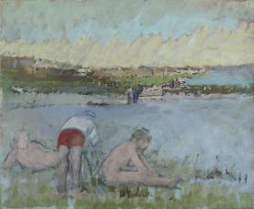 Three bathers, two seated and one standing in erd shorts, on a grassy beach by water with landscape and houses in background