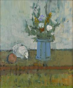Blue vase with flowers, white shell, and orange on brown table