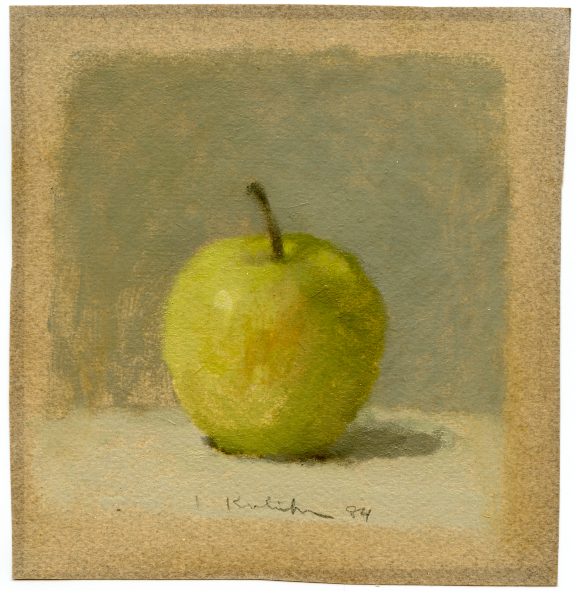 Green apple with stem on white table on blue ground