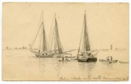 Three sailboats in calm bay with smaller rowboats around
