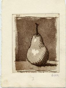 Single pear on table in a rectangle on off-white paper