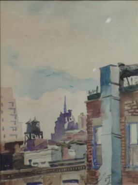 Rooftop cityscape with brick building in foreground, watertowers and tall buildings at center and back