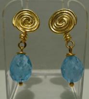 Gold swirl earrings with aqua,arine stones dangling