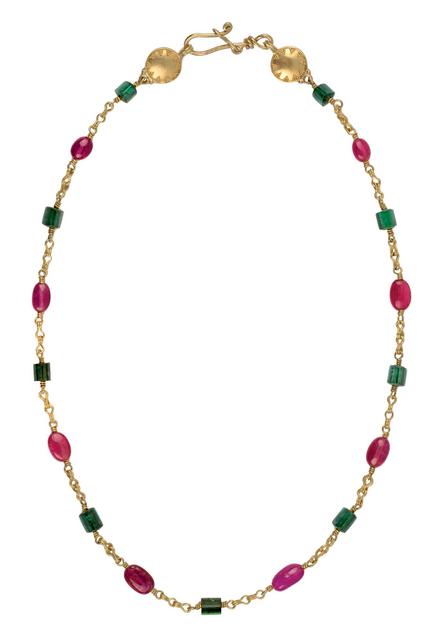 Magenta, emerald beads and gold chain necklace clasp and laid flat