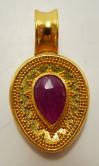Magenta pear gem in gold pendant with small granulation on white ground