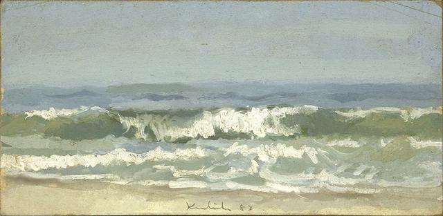 Seascape with breaking waves on beach