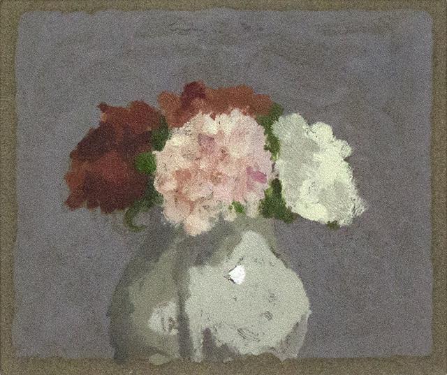 Pink, red, and white flowers in white vase on grey background