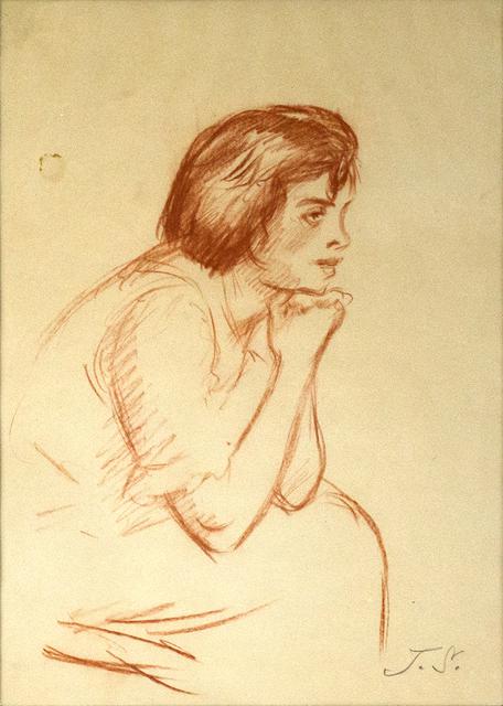 Girl with bob with chin on hands and arms on knees