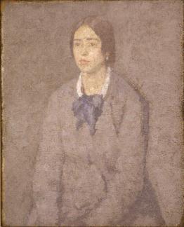 Seated woman wearing grey dress and blue bow, facing slightly left