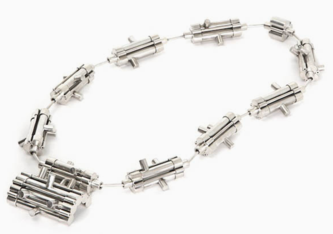 Necklace composed of silver cylindrical tubes on white surface