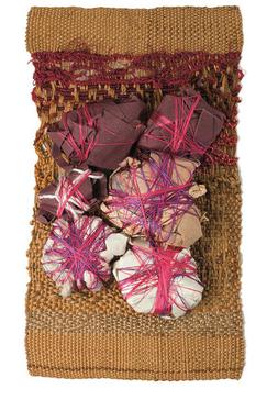 Light brown rectangular weaving with six wrapped bundles at center, wrapped with magenta string
