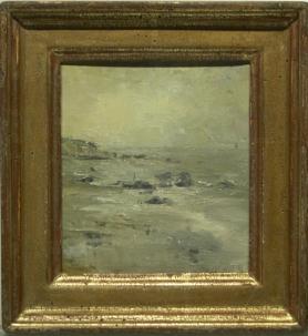 Seascape with rocky shoreline and grey sky in gold frame
