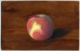 Red and green apple on wood